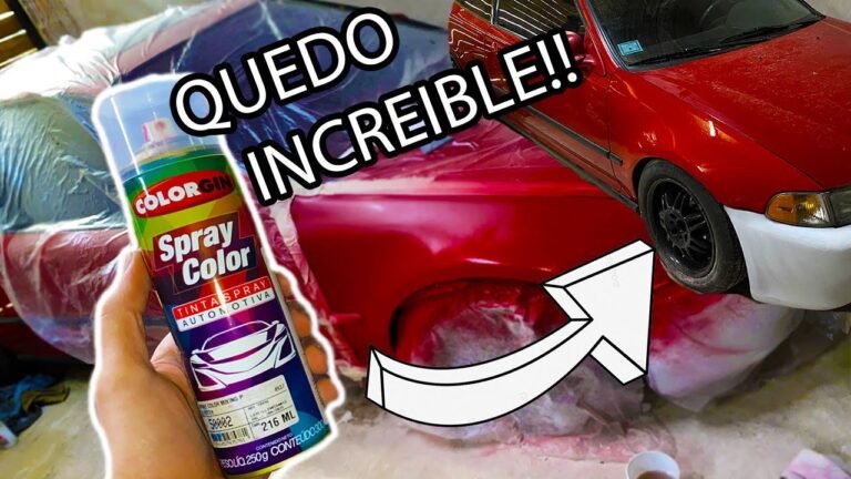 auto siendo pintado con aerosol