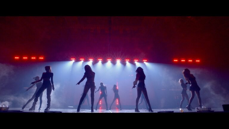 musicas de blackpink en un escenario vibrante