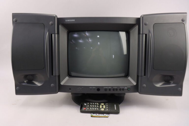 televisor antiguo con control remoto clasico